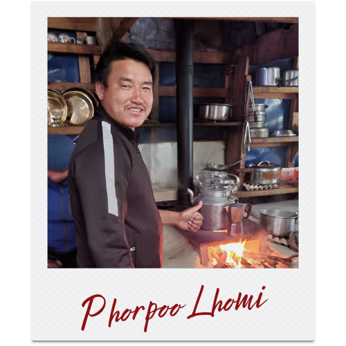 Phorpoo making coffee for the clients with open fire